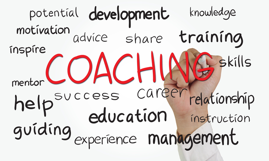 Wort "Coaching" auf einer Glasoberfläche